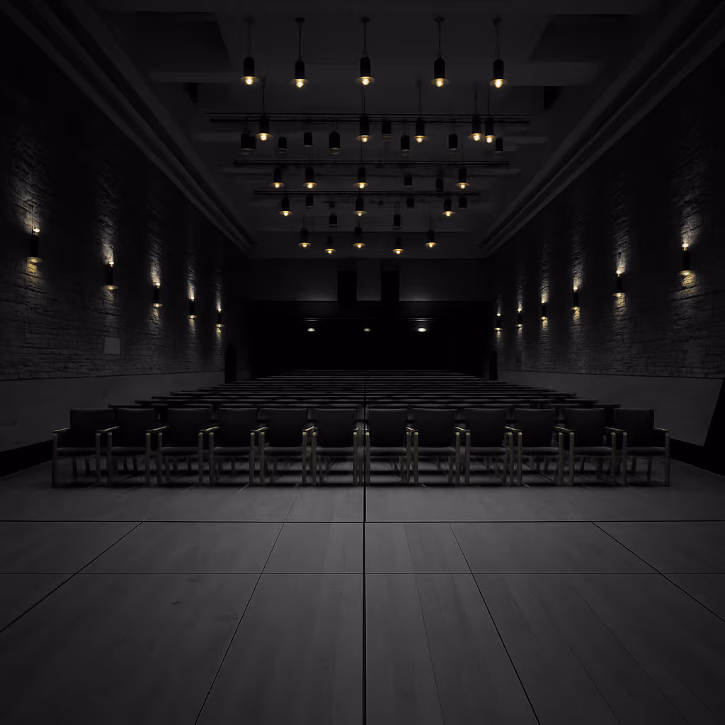 Cinematic black-and-white image of the Budapest Music Center concert hall, featuring minimalist wooden architecture, stone walls, and softly glowing wall and ceiling lights.